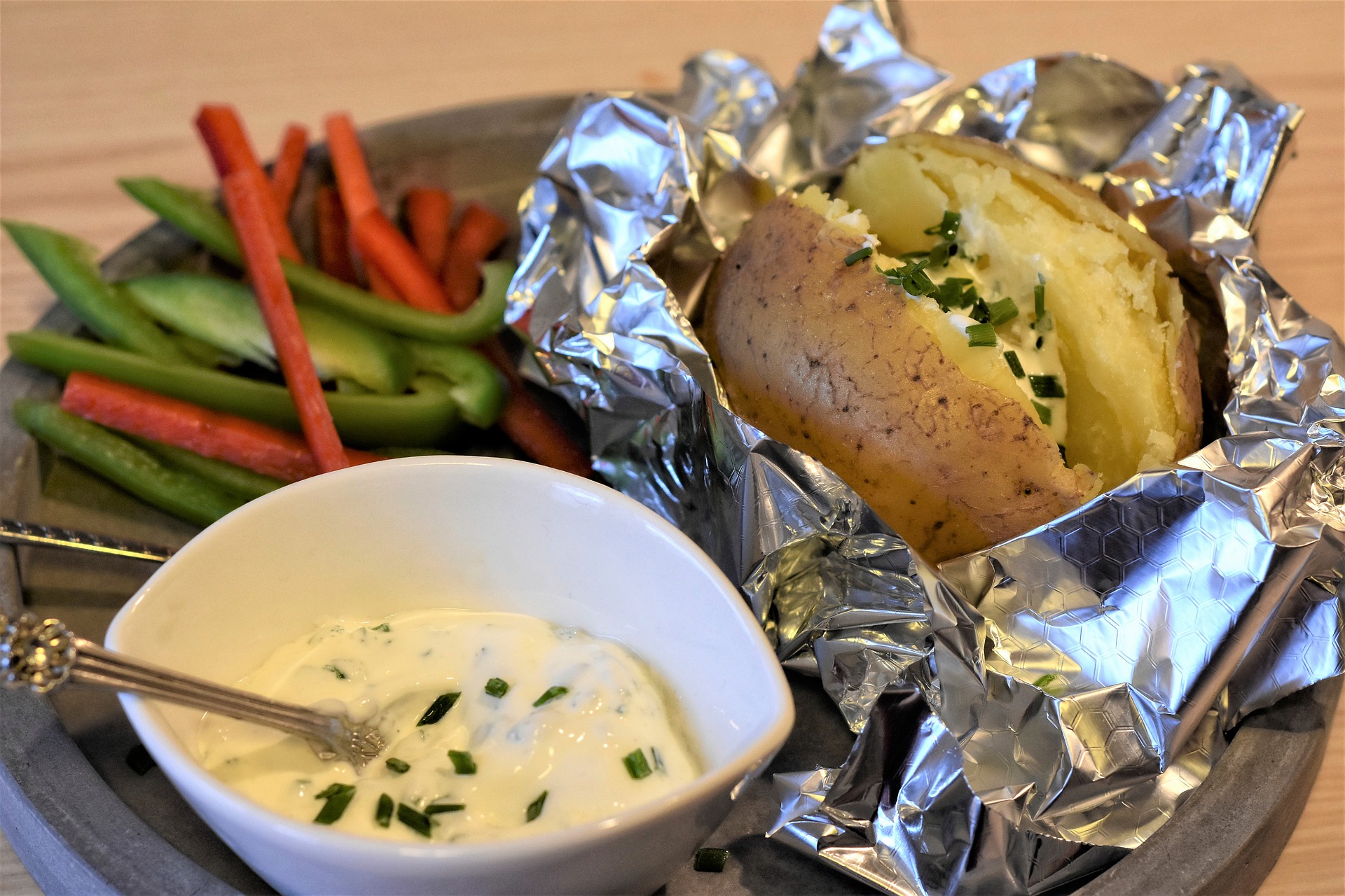 When the mercury begins to dip and cooler days set in, baked potatoes are o...